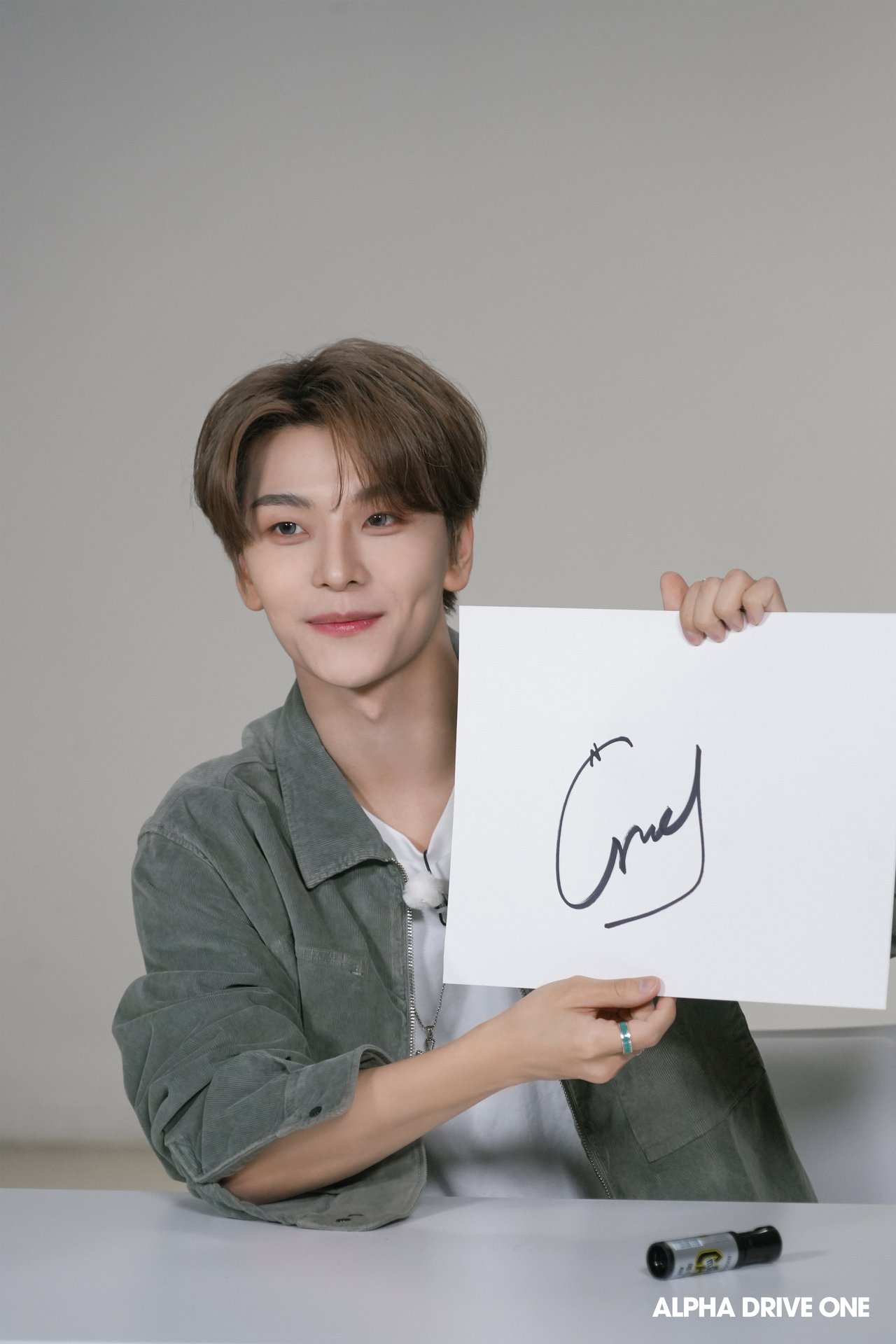 Introducing ALPHA DRIVE ONE's Signature Behind Photo